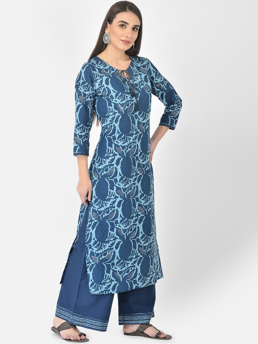 

Pistaa Women Navy Blue Floral Printed High Slit Pure Cotton Kurti With Palazzos