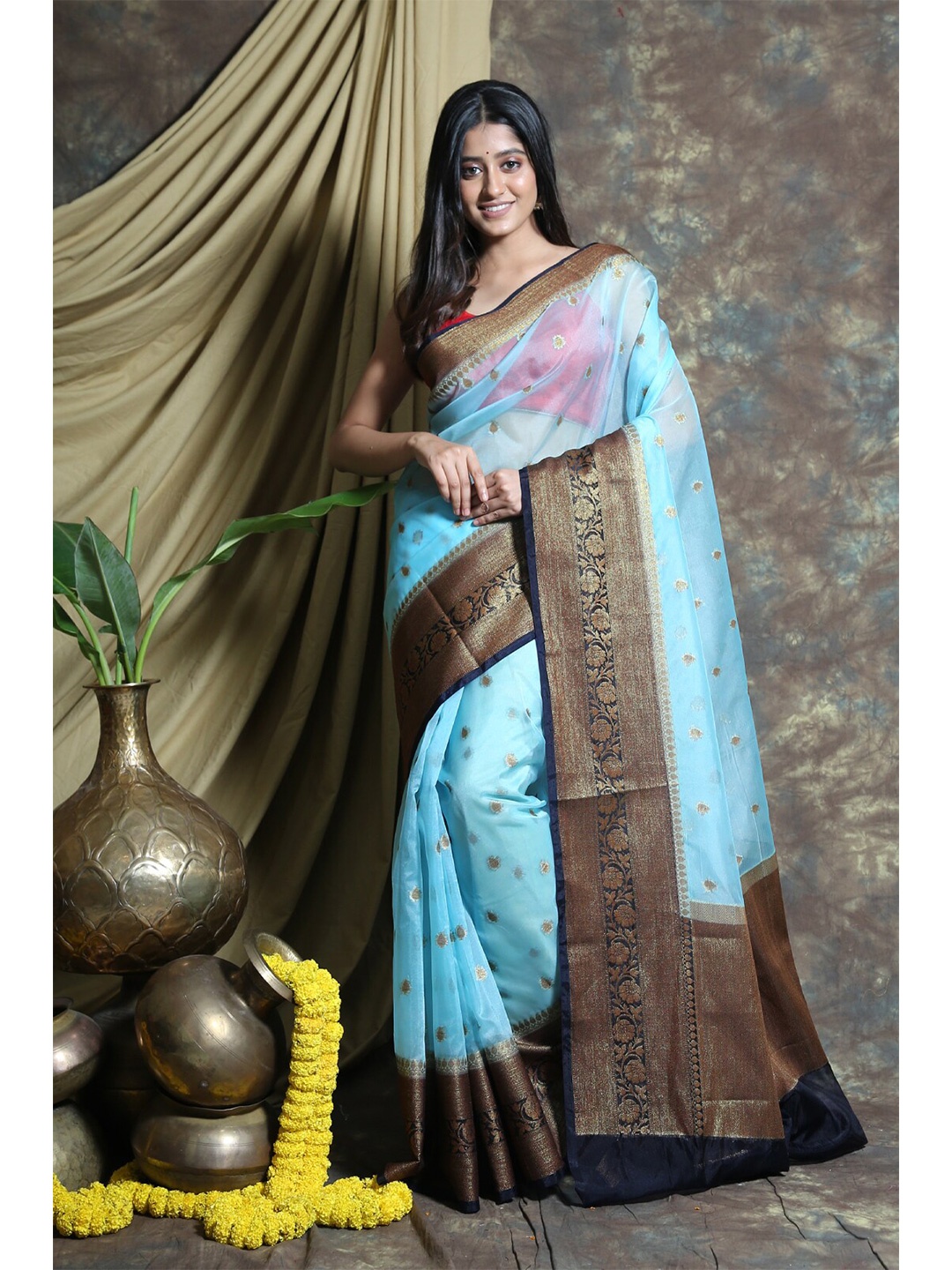 

Charukriti Blue & Gold-Toned Woven Design Zari Organza Saree