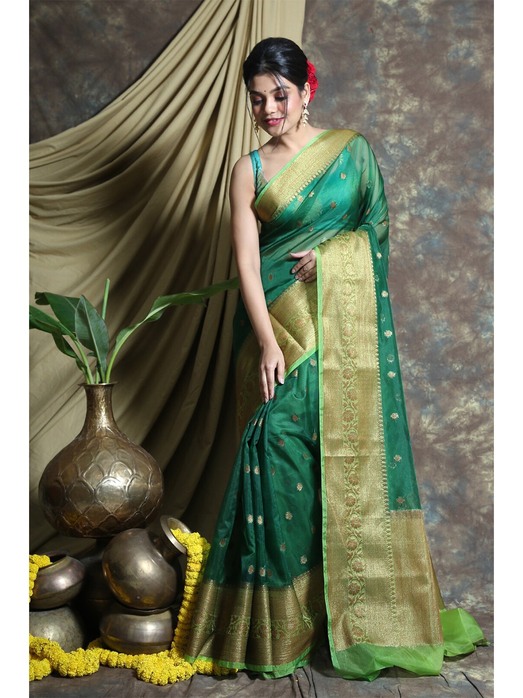 

Charukriti Green & Gold-Toned Ethnic Motifs Organza Saree