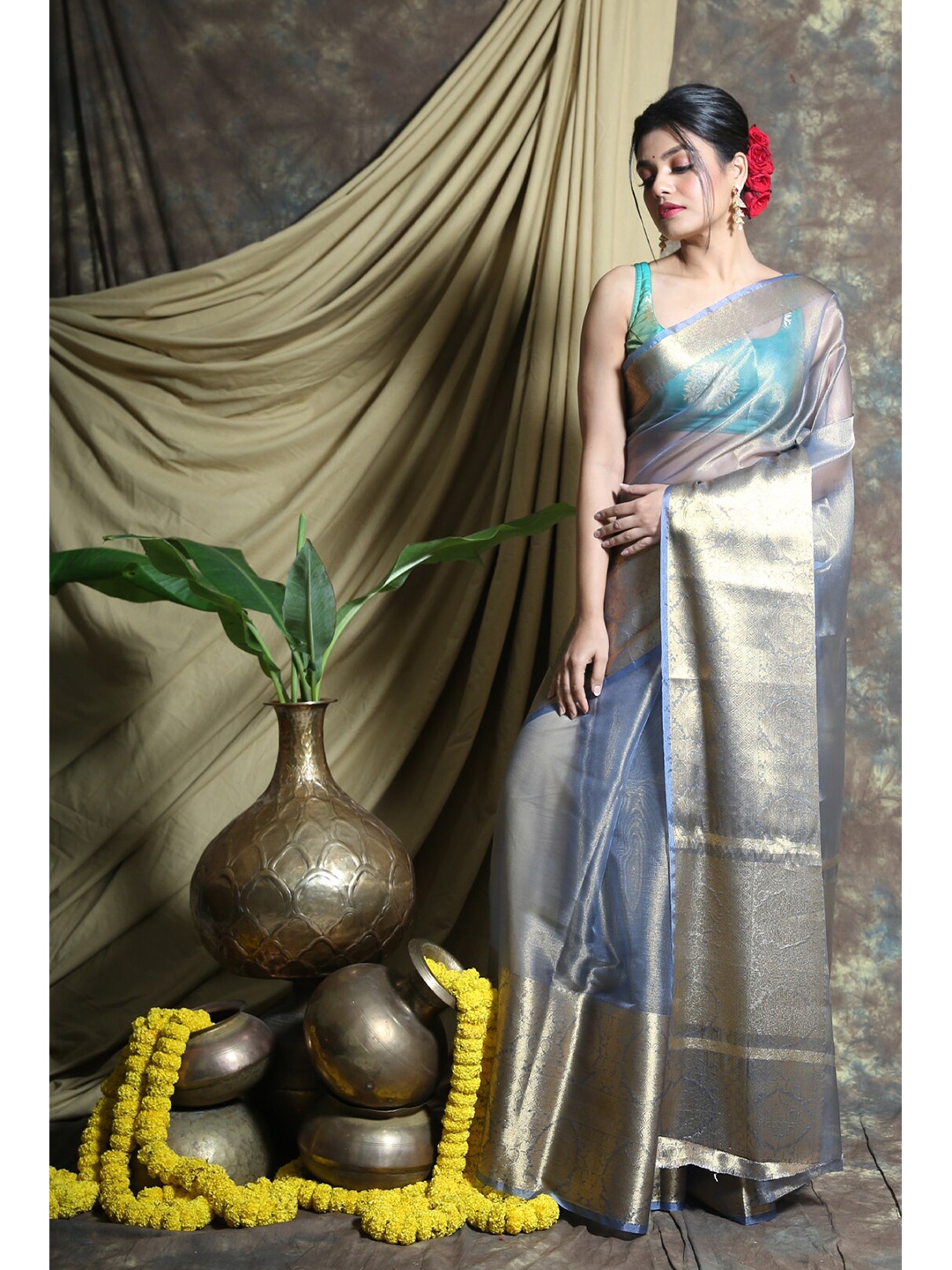 

Charukriti Silver-Toned & Blue Woven Design Zari Tissue Saree