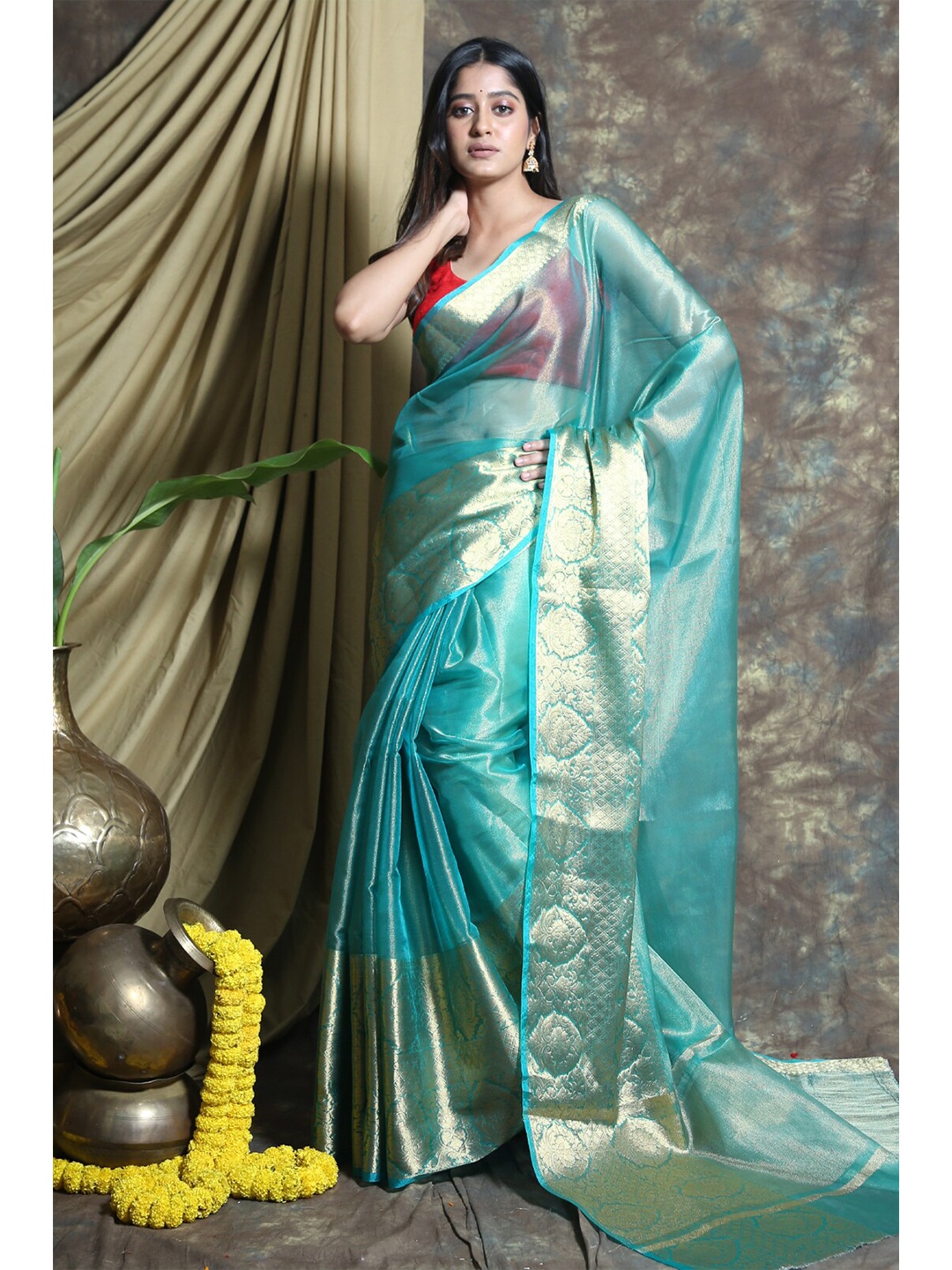 

Charukriti Blue & Gold-Toned Zari Tissue Saree