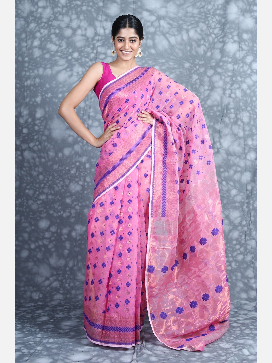 

Charukriti Pink & Blue Ethnic Motifs Zari Silk Cotton Jamdani Saree