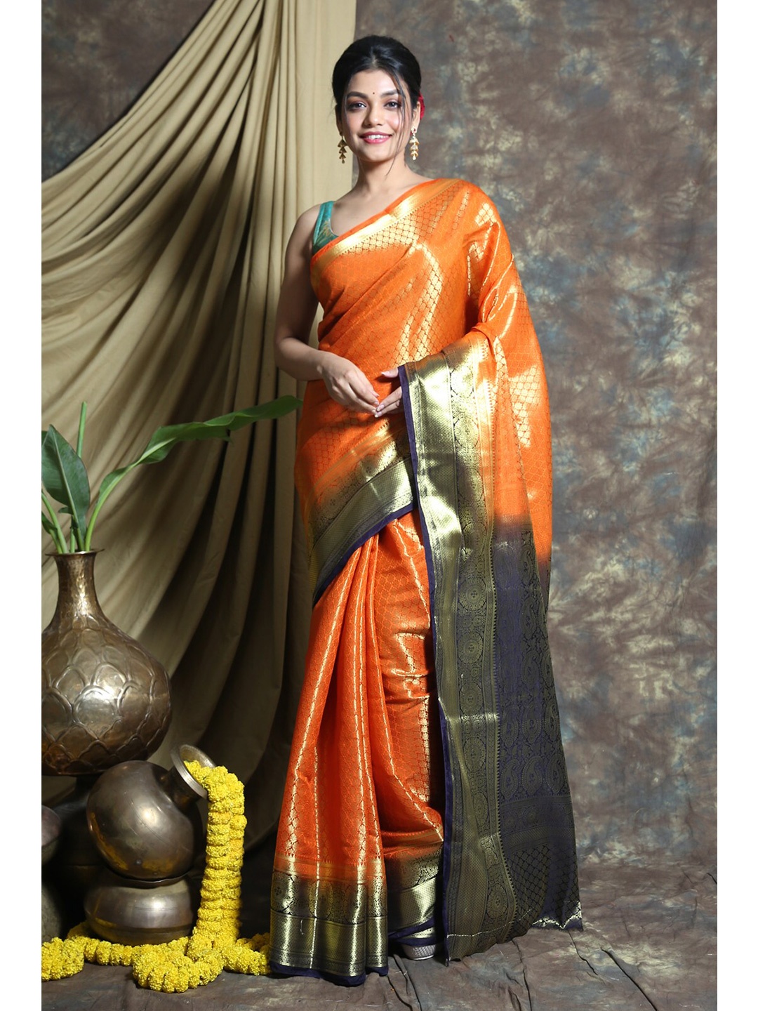 

Charukriti Orange & Navy Blue Ethnic Motifs Zari Brocade Pure Silk Banarasi Saree