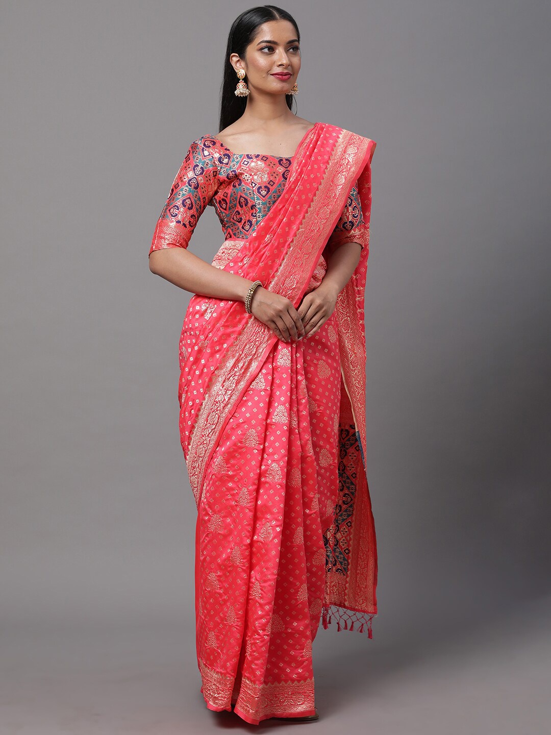 

Mitera Pink & Blue Ethnic Motifs Zari Silk Blend Saree