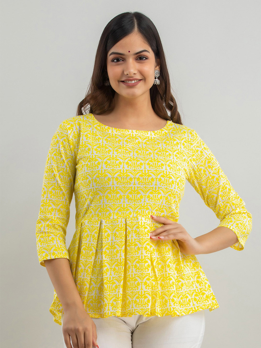 

Women Touch Yellow Ethnic Print Peplum Pure Cotton Top