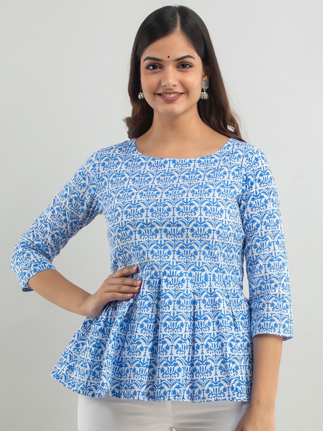 

Women Touch Blue Ethnic Print Peplum Pure Cotton Top