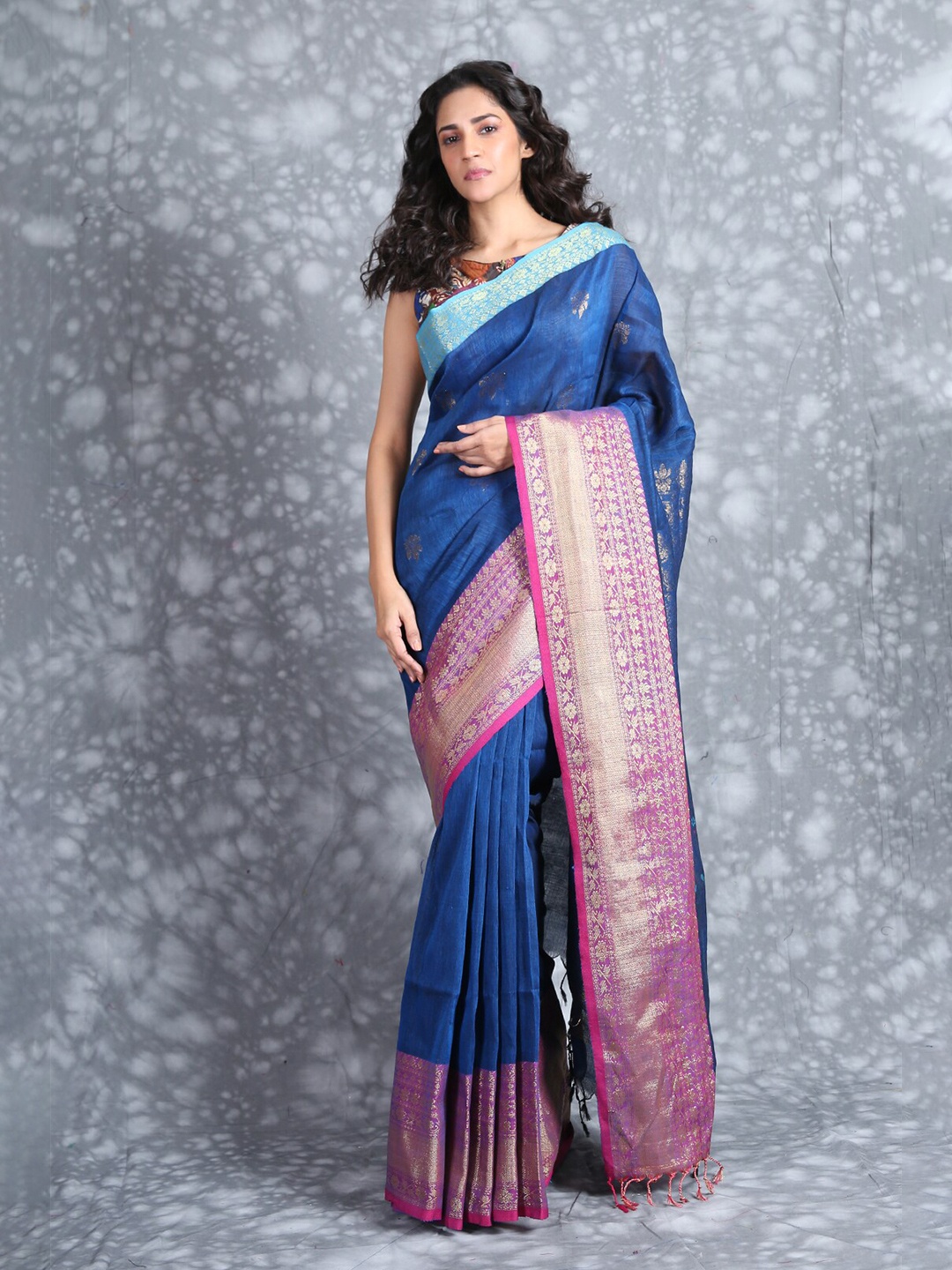 

Charukriti Blue & Pink Ethnic Motifs Zari Pure Linen Saree
