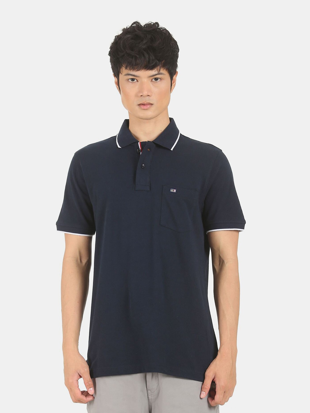 

Arrow Men Navy Blue & White Solid Cotton Polo Collar T-shirt