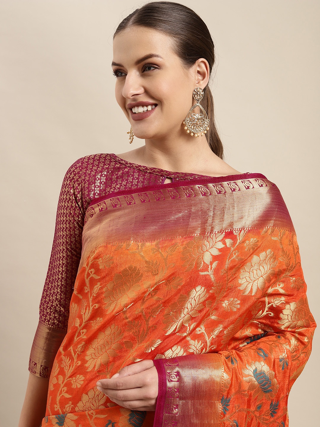 

Mitera Orange & Gold-Toned Floral Woven Design Silk Blend Saree