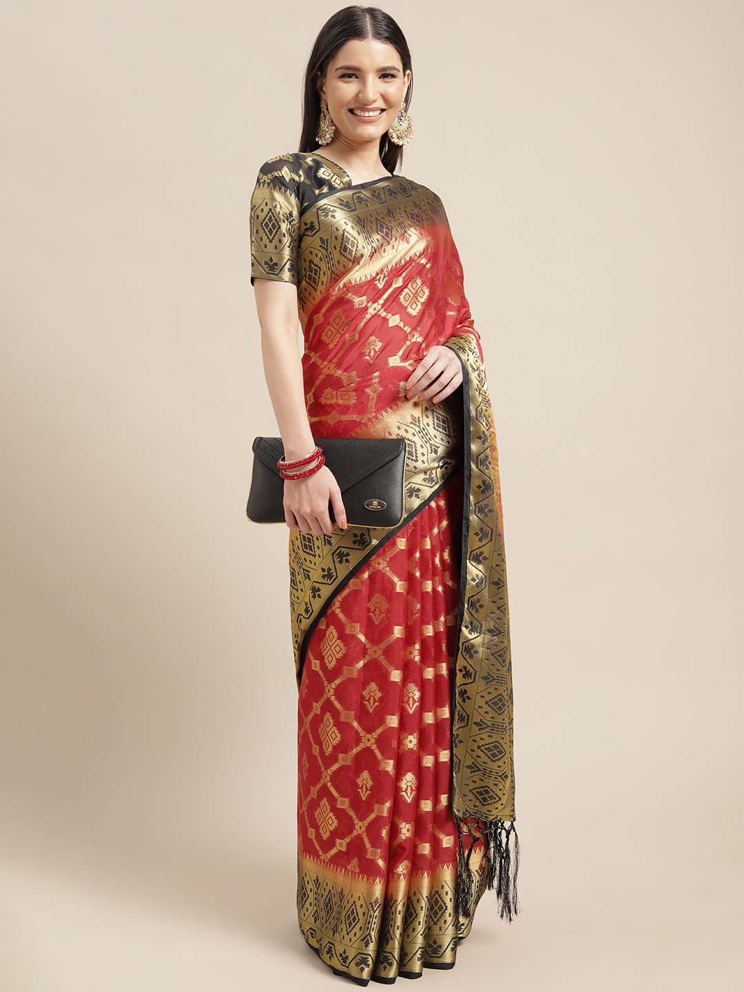 

Mitera Maroon & Gold Ethnic Motifs Woven Design Silk Blend Saree