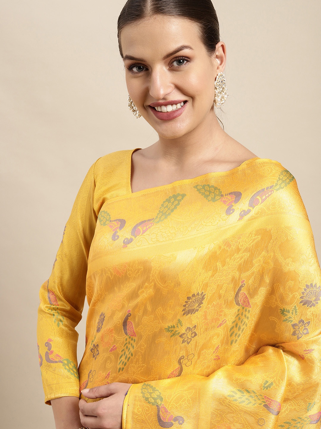 

Mitera Yellow Ethnic Motifs Silk Blend Saree