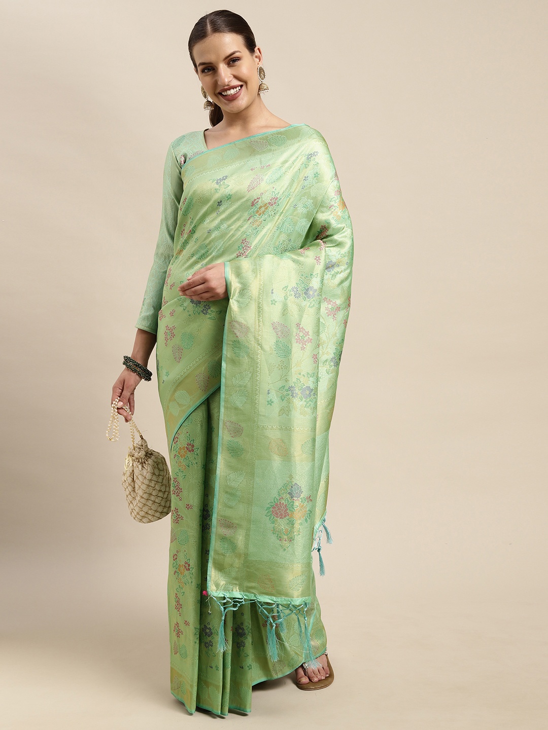 

Mitera Sea Green Ethnic Motifs Silk Blend Saree