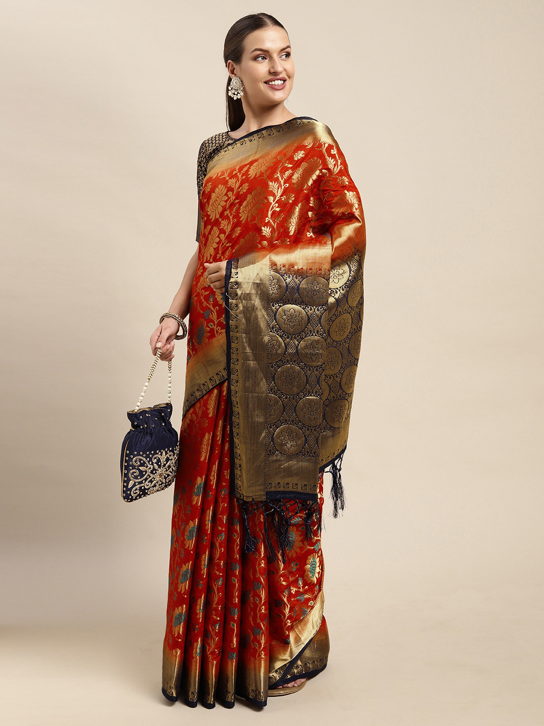 

Mitera Red & Golden Ethnic Motifs Silk Blend Saree
