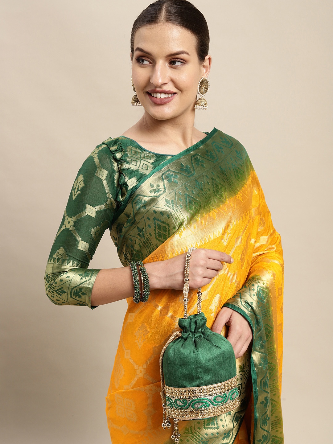 

Mitera Mustard & Green Ethnic Motifs Silk Blend Saree