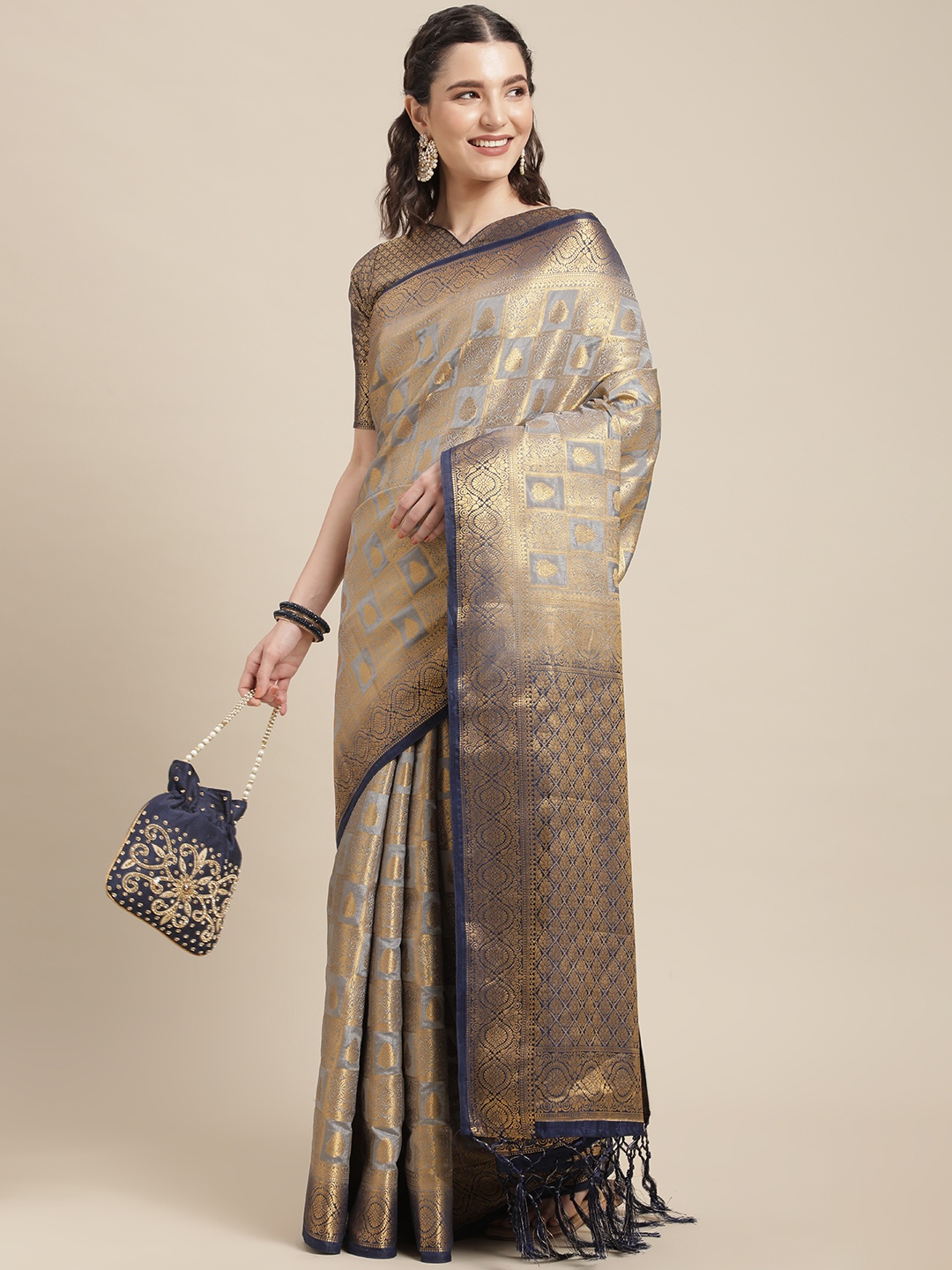 

Mitera Grey & Gold Ethnic Motifs Woven Design Silk Blend Saree