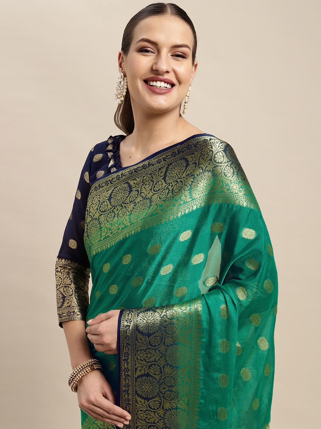 

Mitera Green & Navy Blue Ethnic Motifs Silk Blend Saree