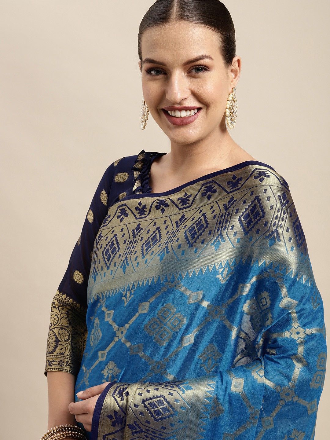 

Mitera Blue & Golden Woven Design Silk Blend Saree