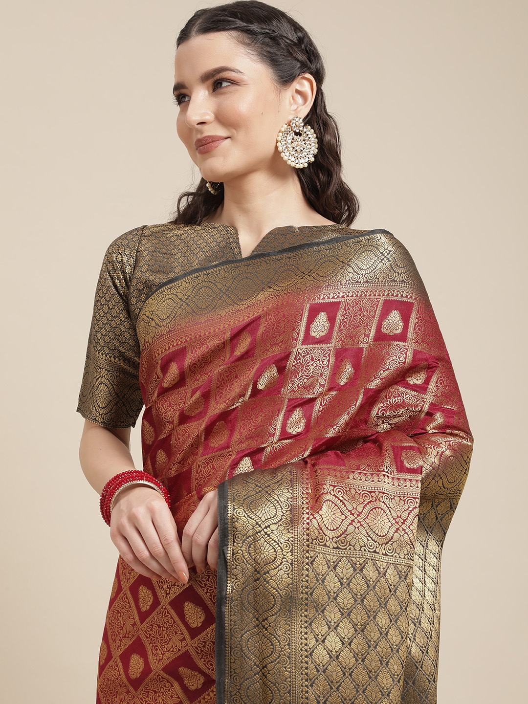 

Mitera Pink & Gold Ethnic Motifs Woven Design Silk Blend Saree