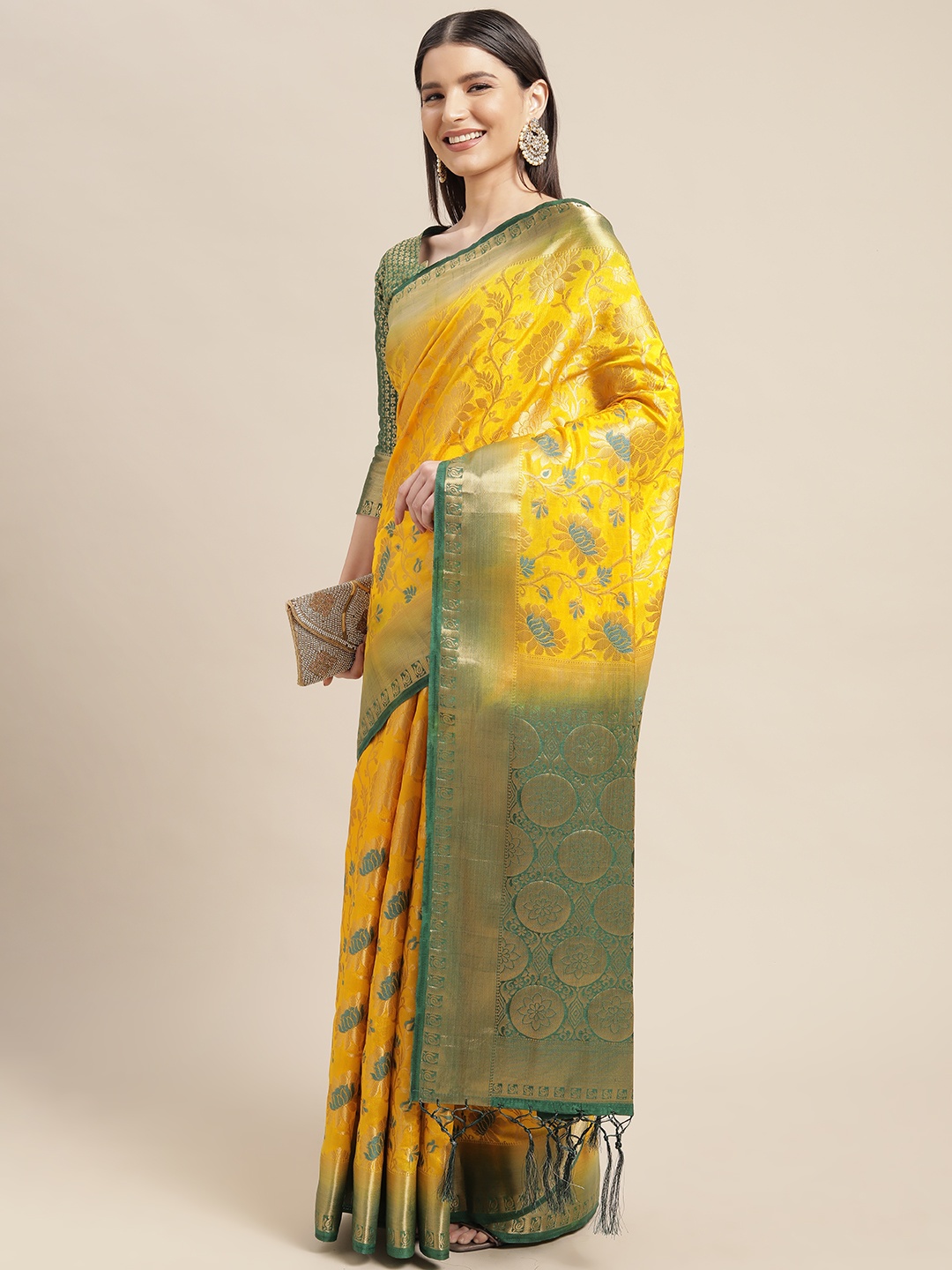 

Mitera Mustard Yellow & Green Ethnic Motifs Silk Blend Saree