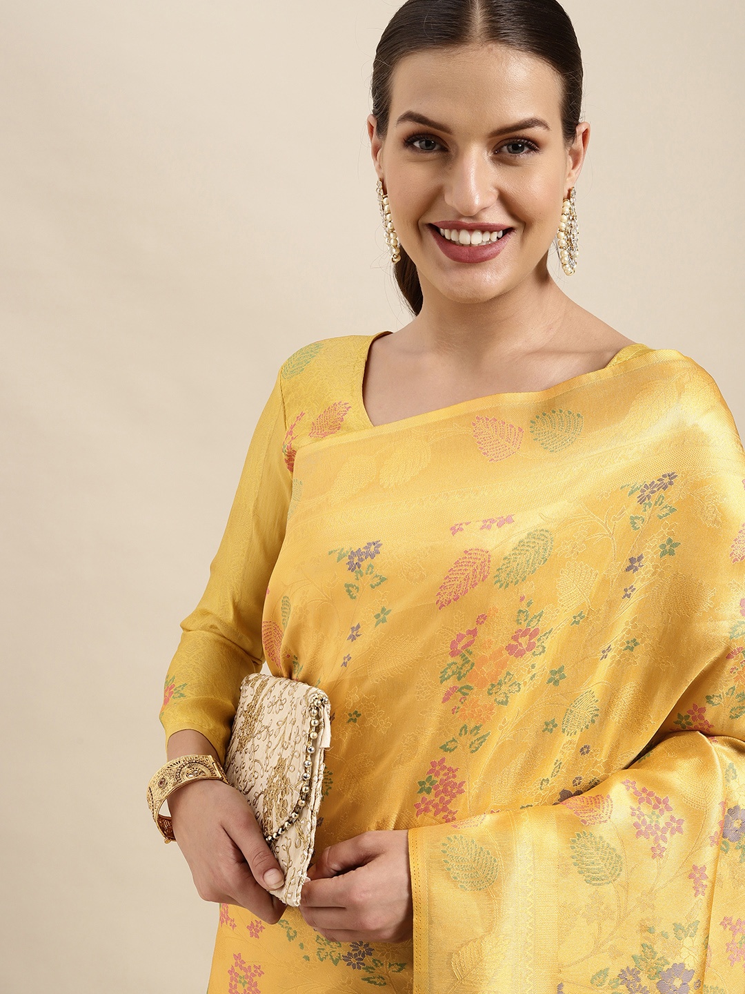 

Mitera Yellow Ethnic Motifs Silk Blend Saree