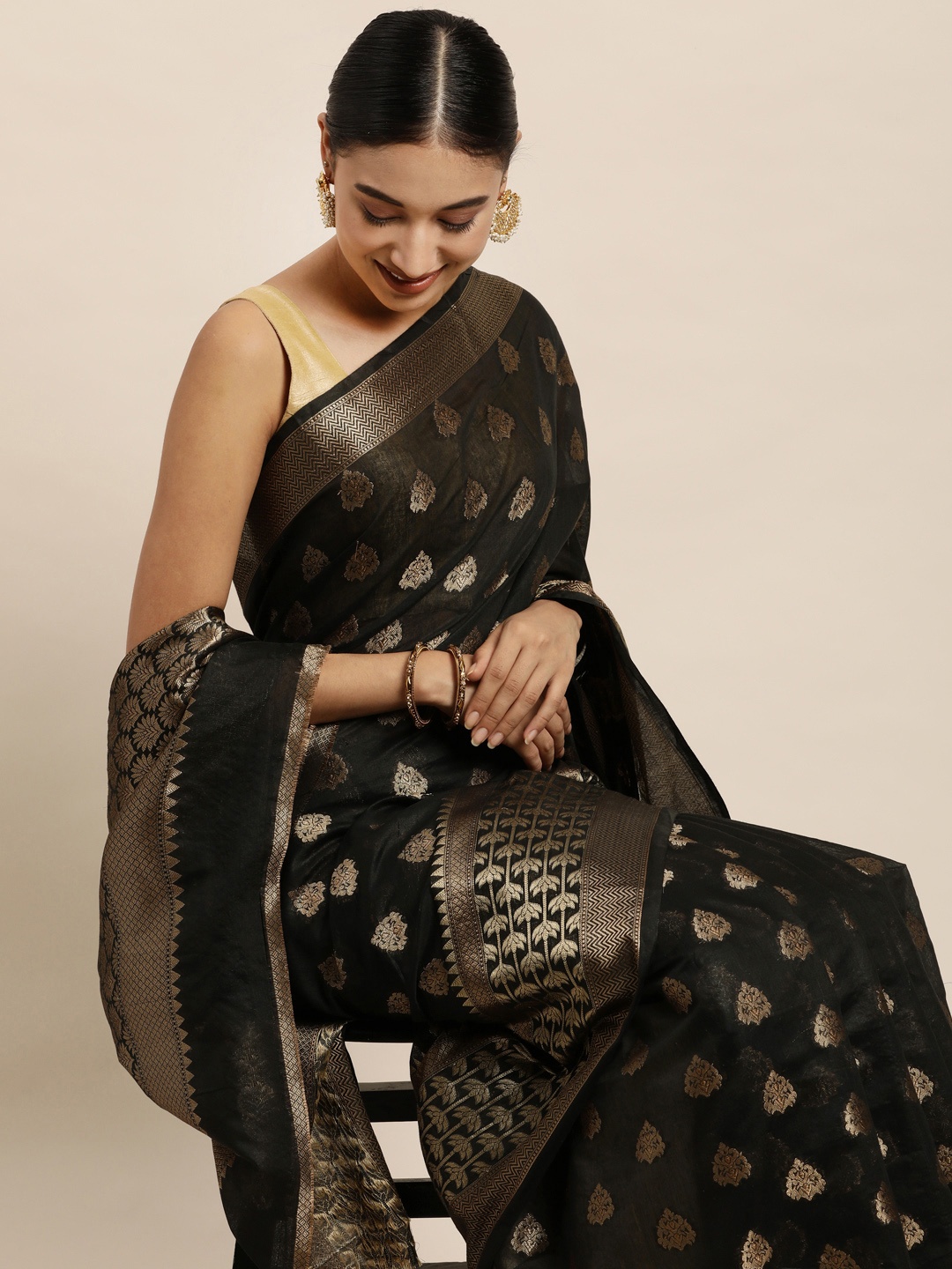 

Saree Swarg Black & Gold-Toned Ethnic Motifs Zari Silk Cotton Banarasi Sarees