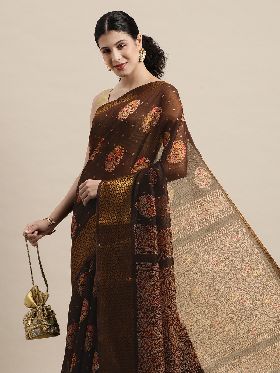 

Saree Swarg Brown & Peach-Coloured Ethnic Motifs Chanderi Sarees