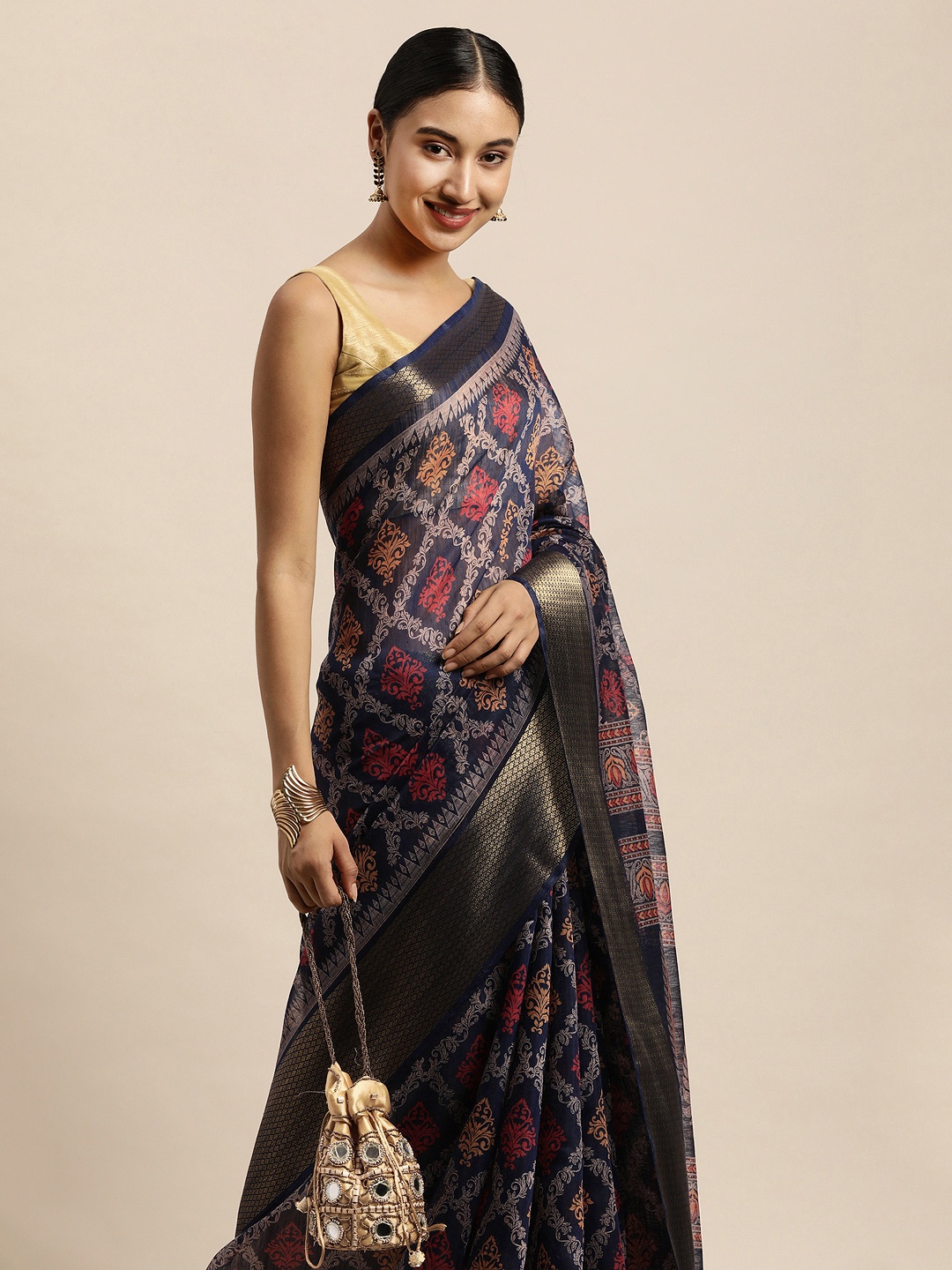 

Saree Swarg Navy Blue & Orange Ethnic Motifs Chanderi Sarees