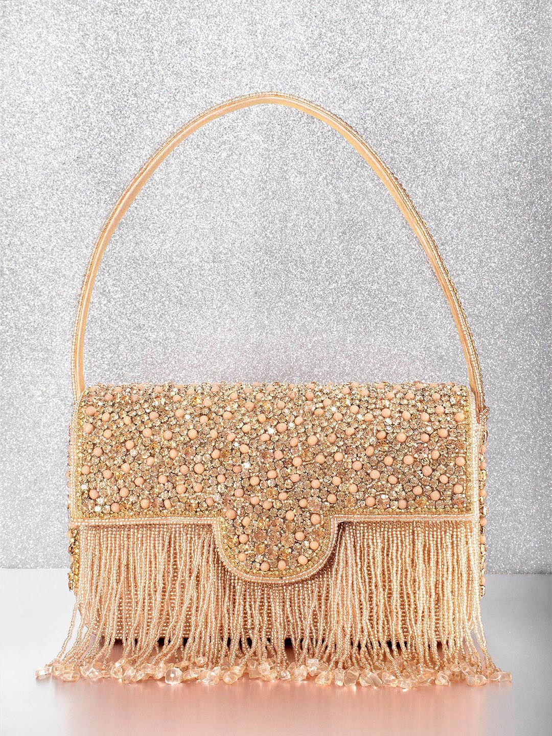 

Peora Rose Gold Embellished Fringed Foldover Clutch
