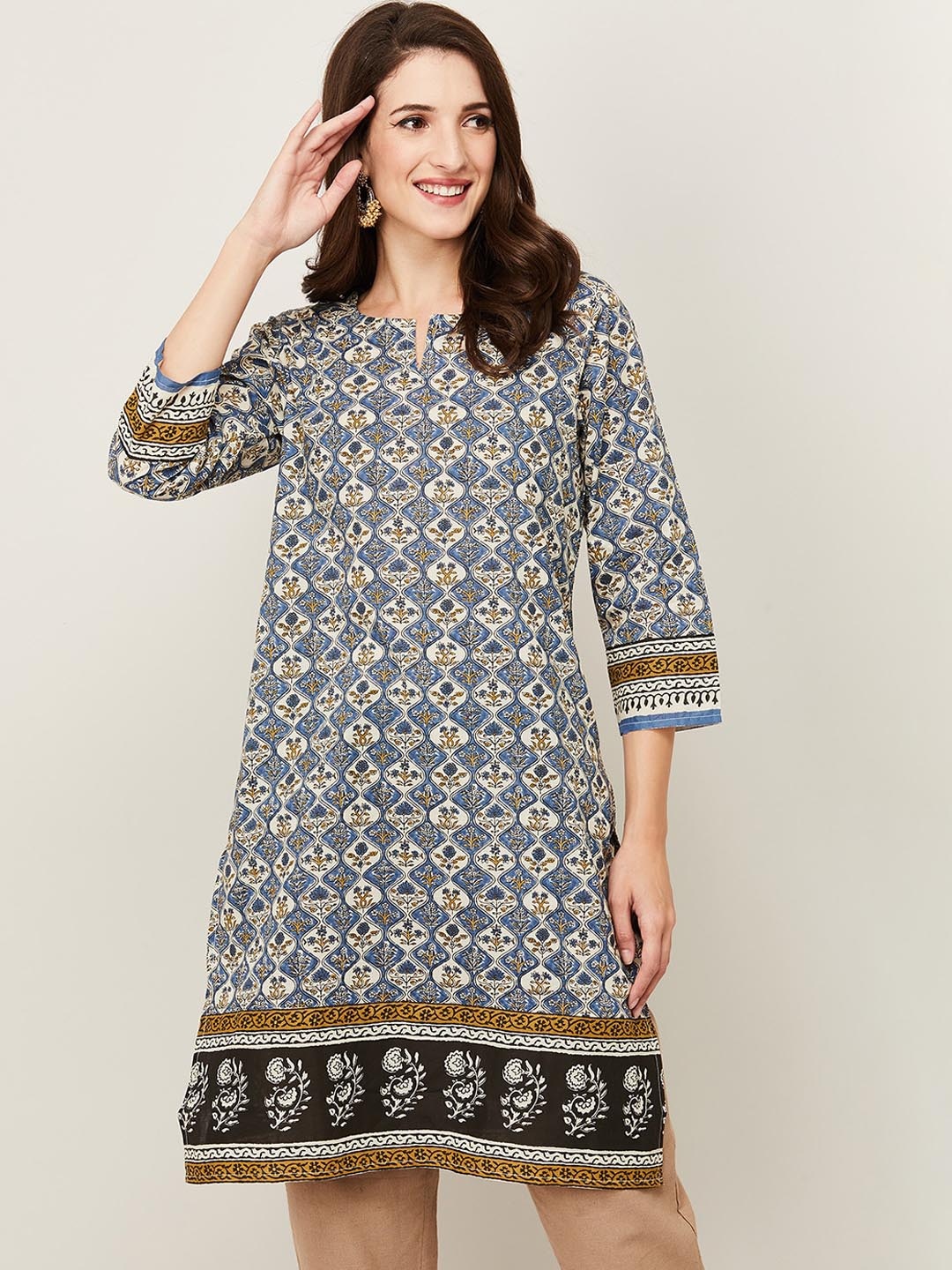 

Melange by Lifestyle Women Blue Ethnic Motifs Printed Cotton Kurta