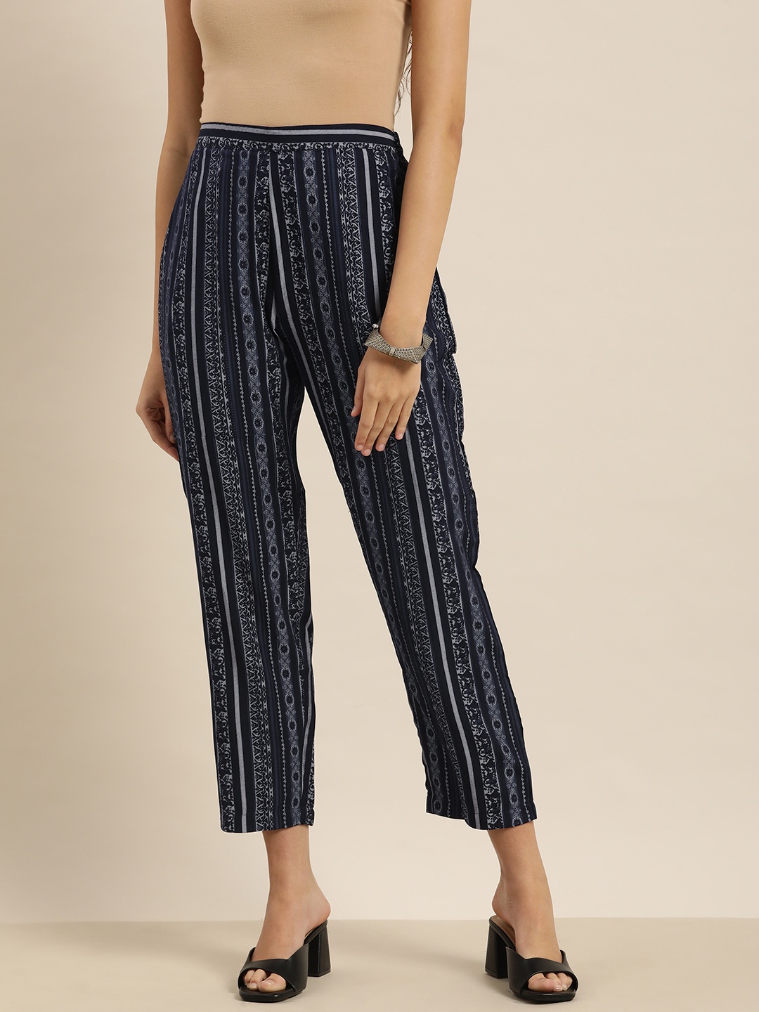 

Sangria Women Navy Blue & White Ethnic Motif Printed Trouser