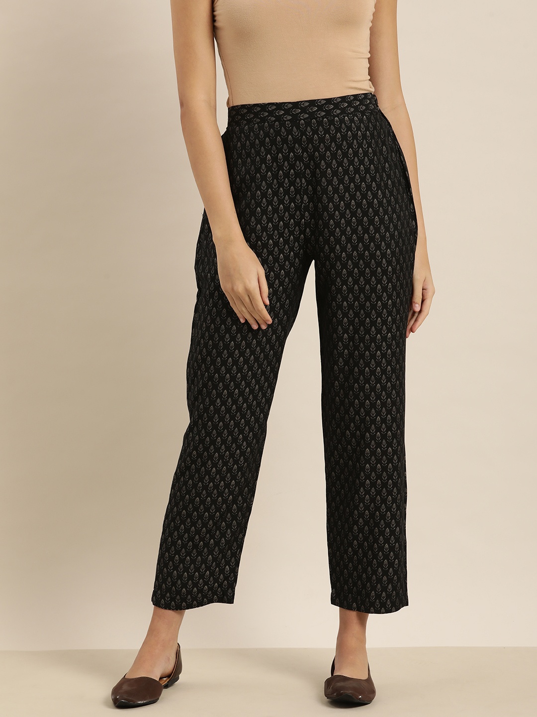 

Sangria Women Black & Grey Ethnic Motif Printed Trouser