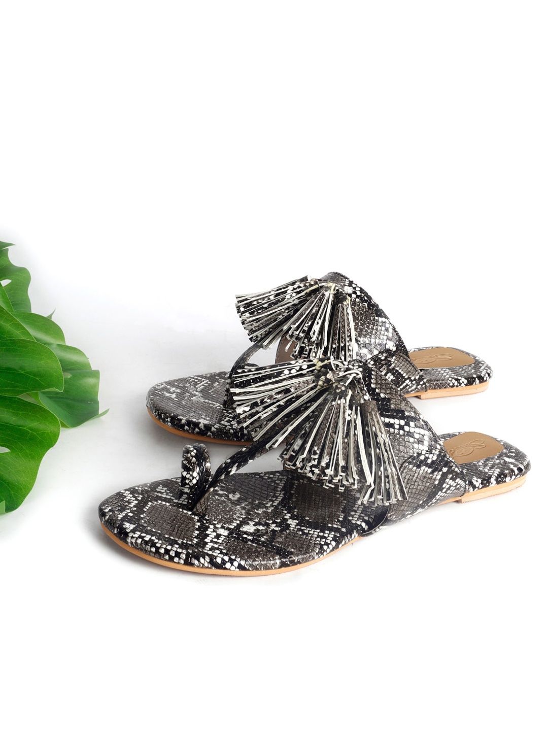 

Sole House Women Black & White Snake Print One Toe Flats with Tassels Flats
