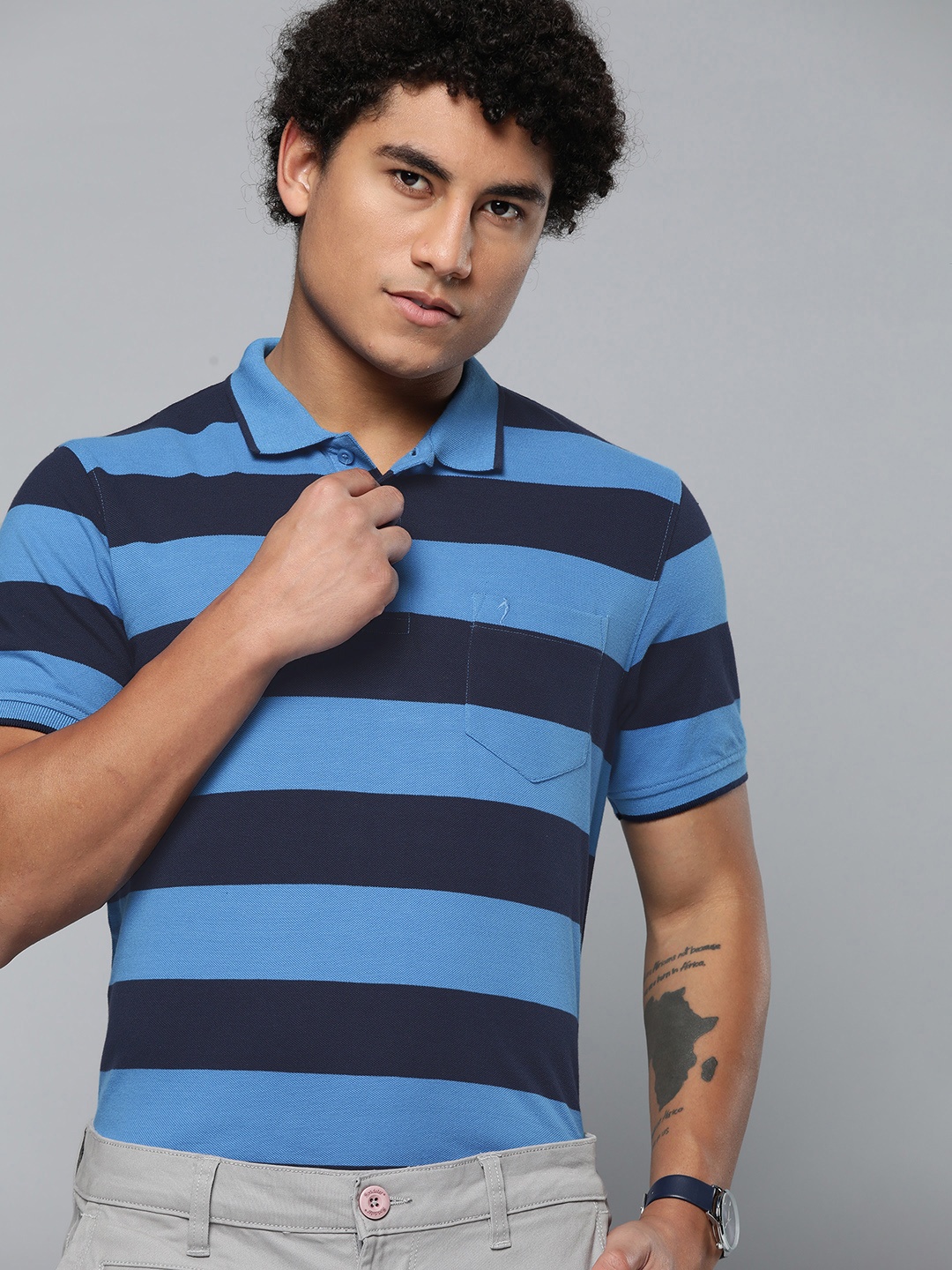 

Indian Terrain Men Navy Blue Striped Polo Collar Pure Cotton T-shirt