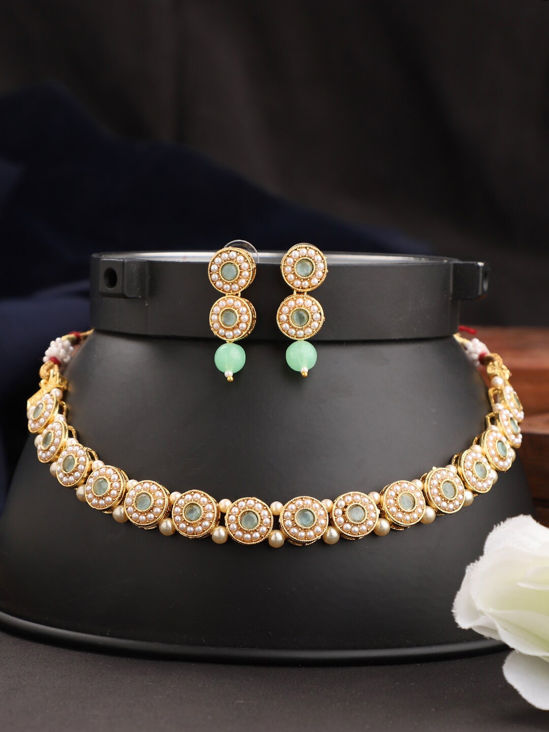 

ANIKAS CREATION Gold Plated Sea-Green & White Kundan Studded Jewellery Set