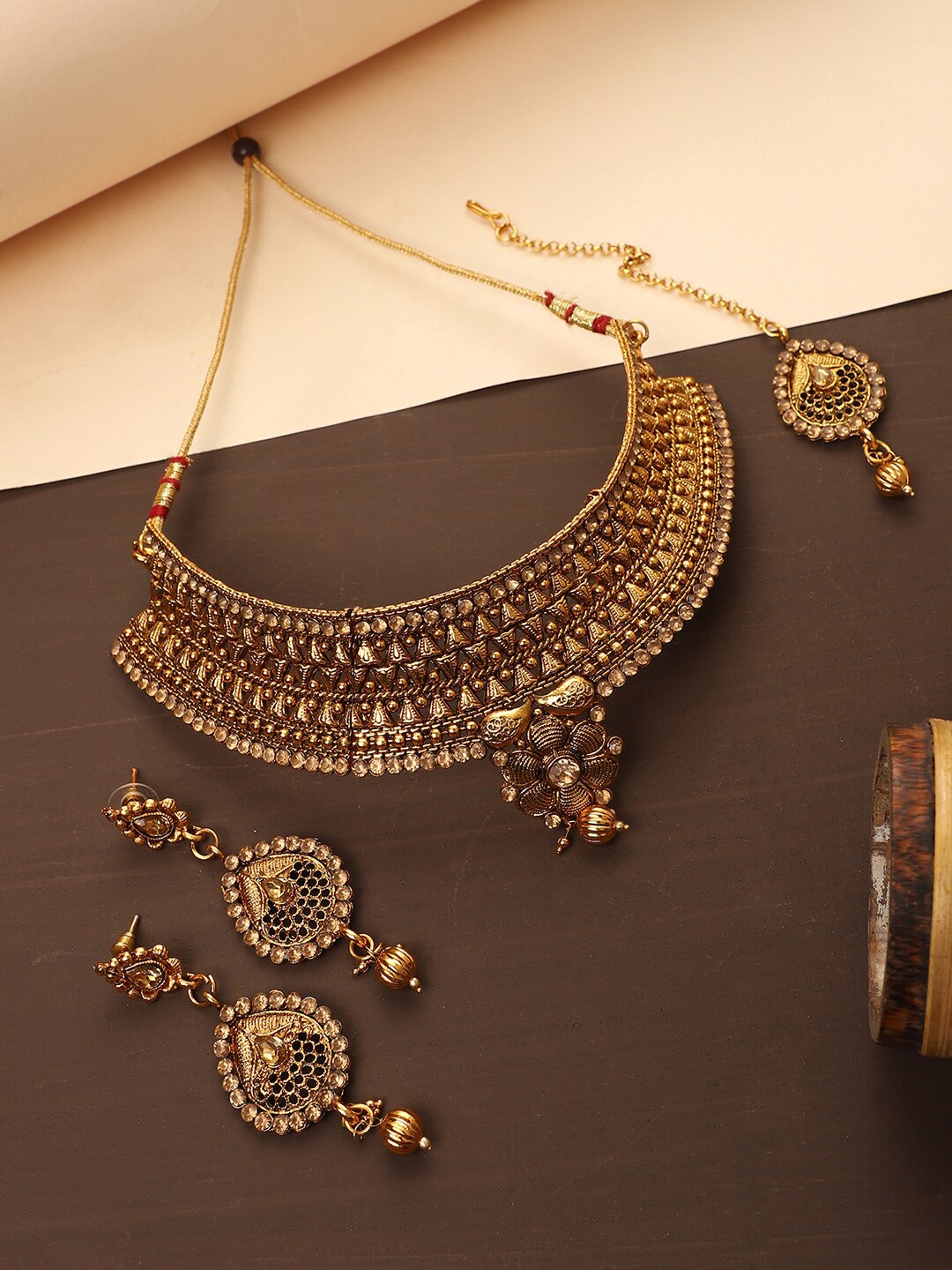 

ANIKAS CREATION Gold-Plated & Stone-Studded Jewellery set