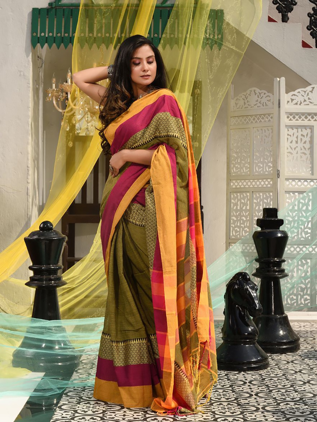 

Charukriti Mustard & Green Striped Saree