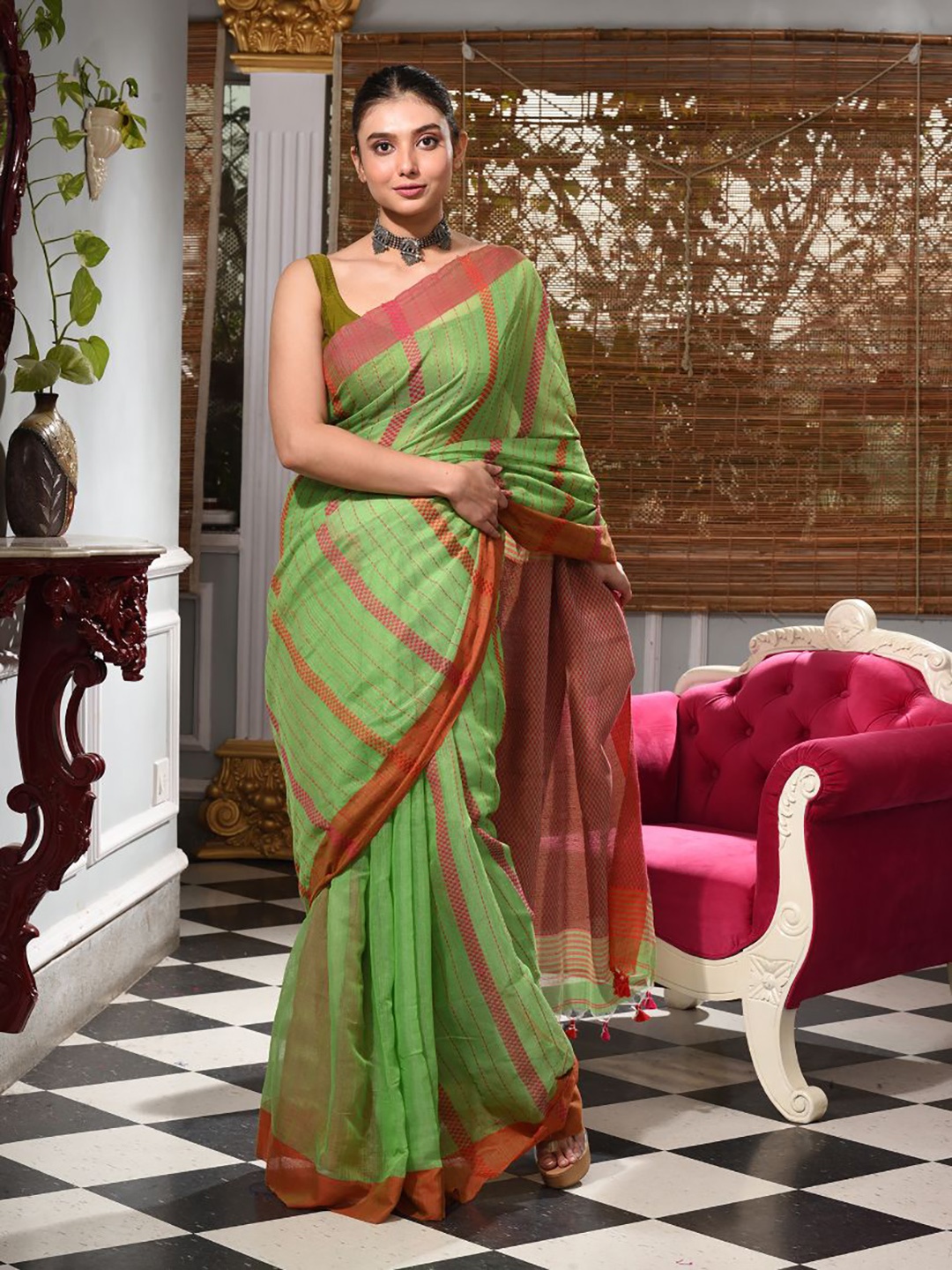 

Charukriti Green & Pink Striped Silk Cotton Saree