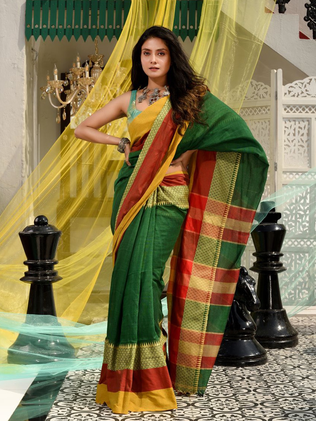 

Charukriti Green & Yellow Colourblocked Handloom Saree