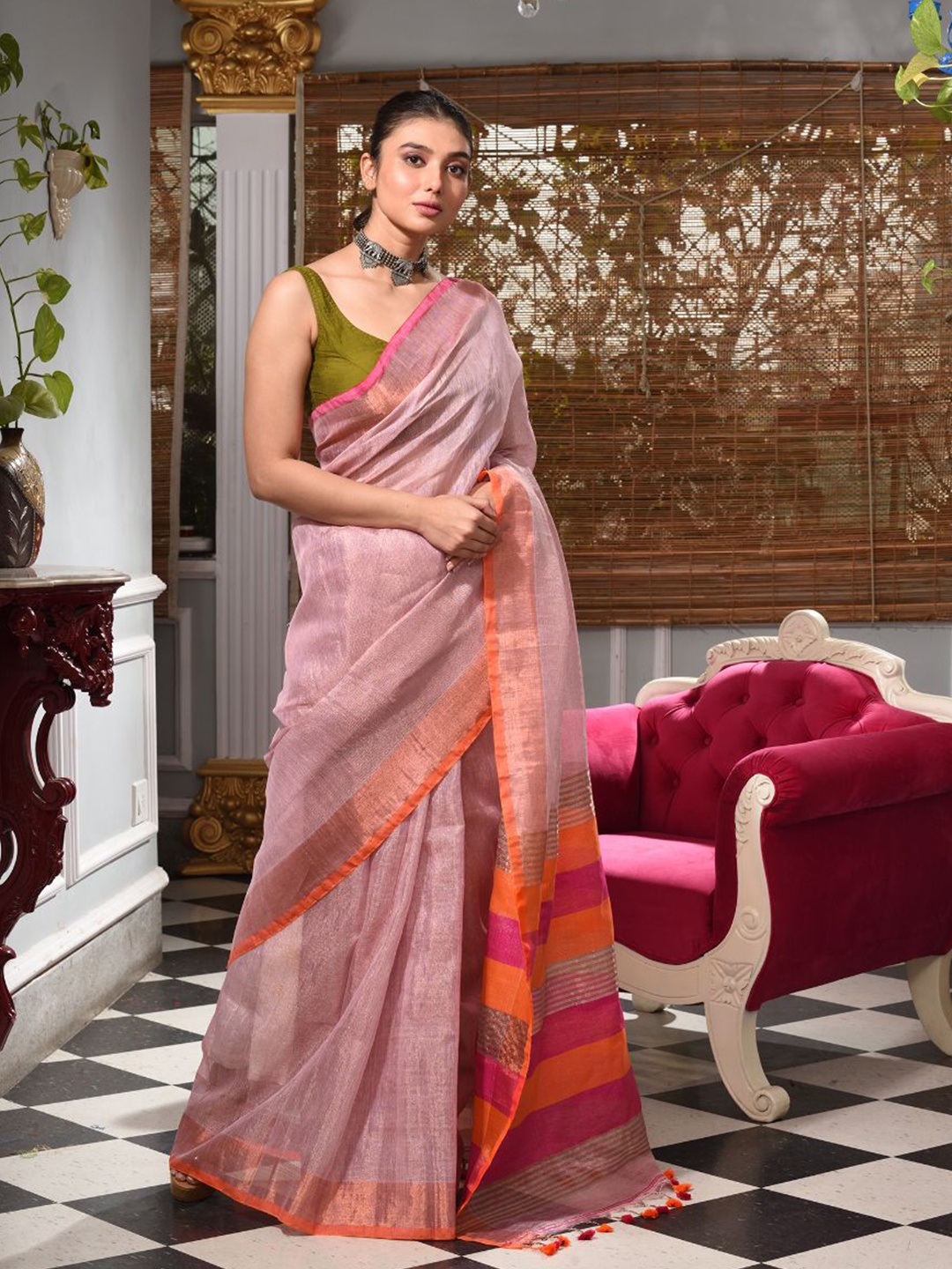 

Charukriti Mauve & Orange Solid Woven Design Tissue Handwoven Saree