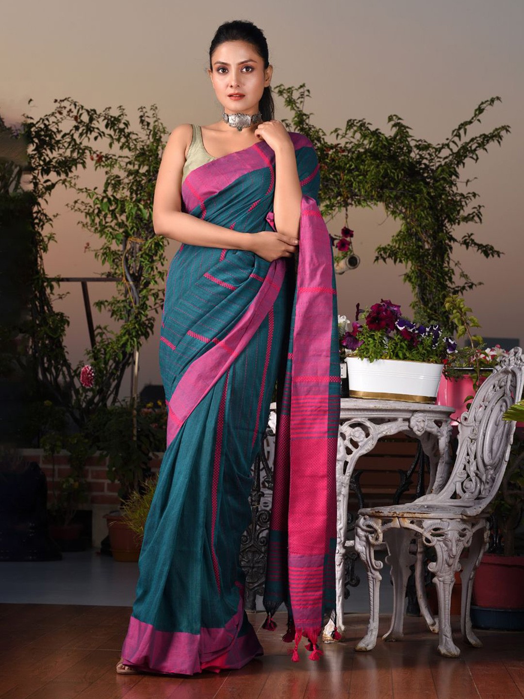 

Charukriti Teal & Pink Woven Design Pure Cotton Saree