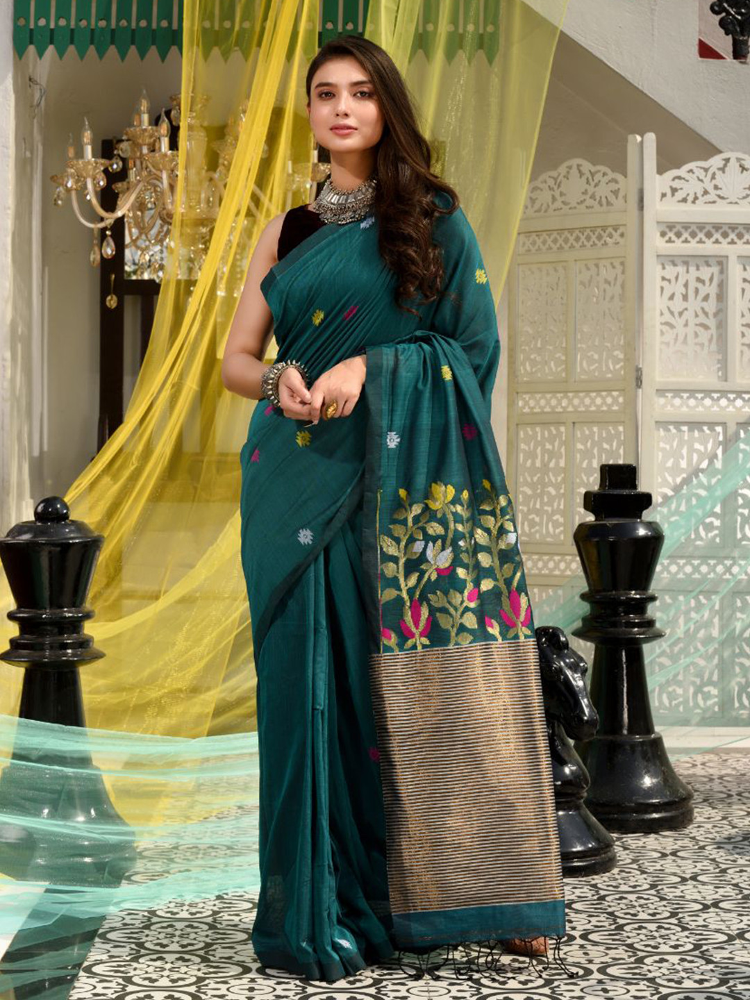 

Charukriti Teal & Gold-Toned Floral Saree