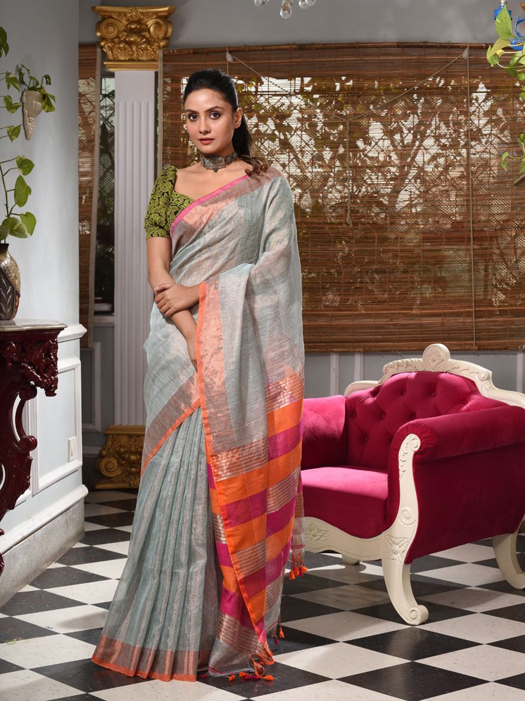 

Charukriti Silver-Toned & Orange Woven Design Handloom Tissue Saree