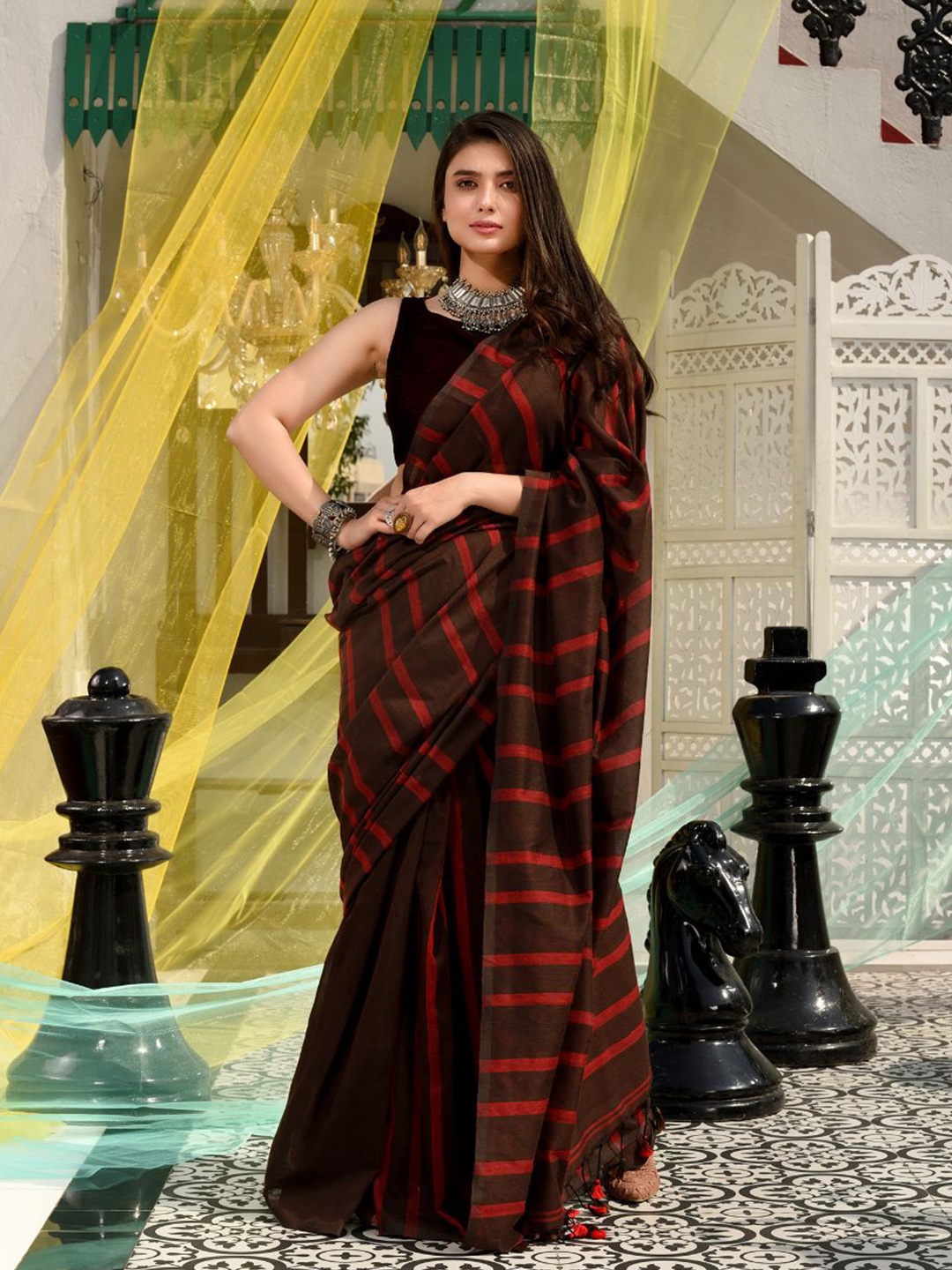 

Charukriti Brown & Red Striped Pure Cotton Saree