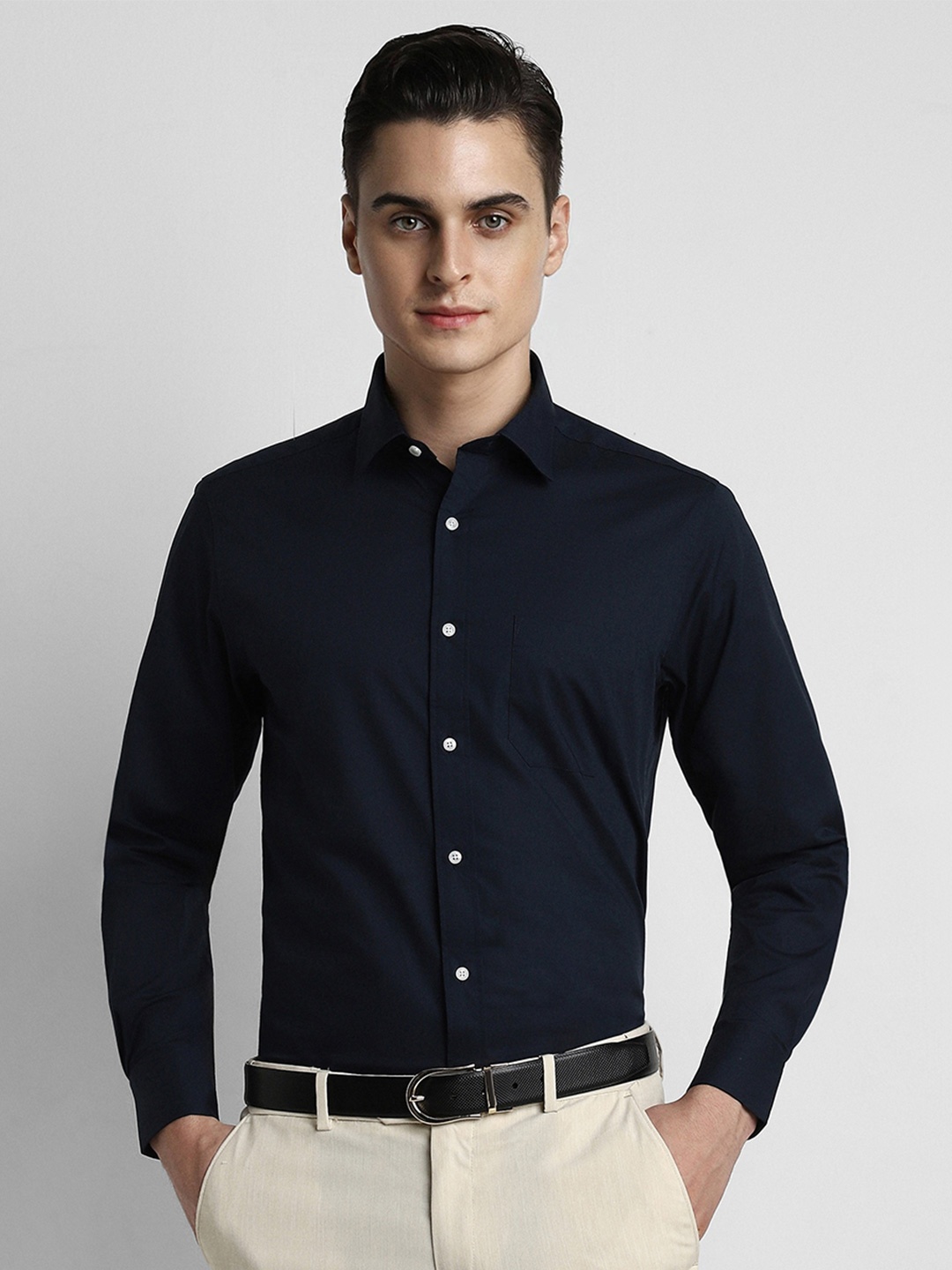 

Peter England Men Black Solid Formal Shirt