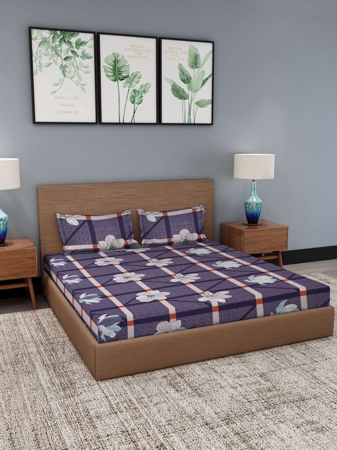 

Dhrohar Navy Blue & White Floral Printed 180 TC King Bedsheet with 2 Pillow Covers