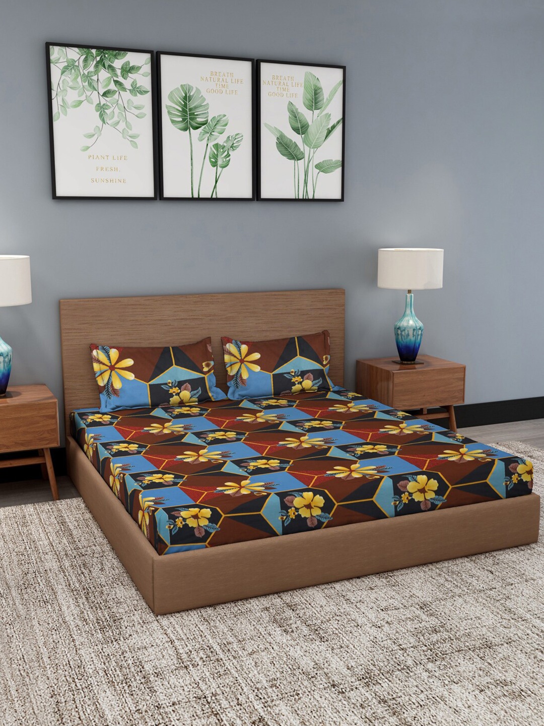 

Dhrohar Brown & Blue Floral Printed 180 TC King Bedsheet with 2 Pillow Covers