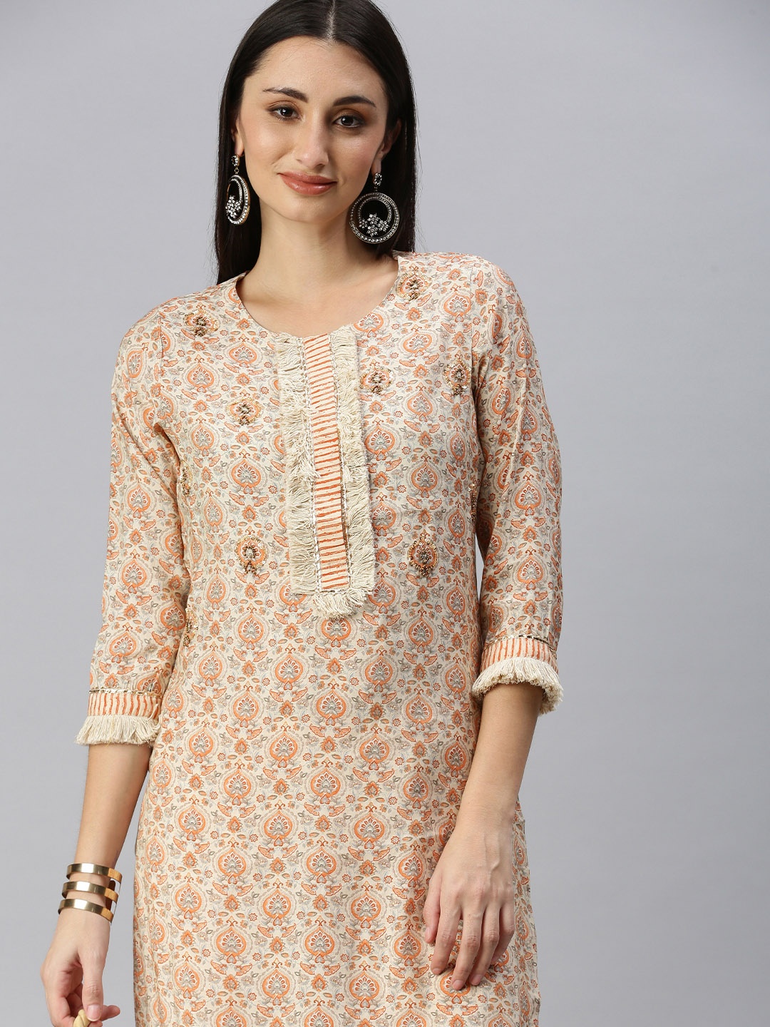 

SHOWOFF Women Cream-Coloured Floral Beads & Stones Straight Kurta Sets
