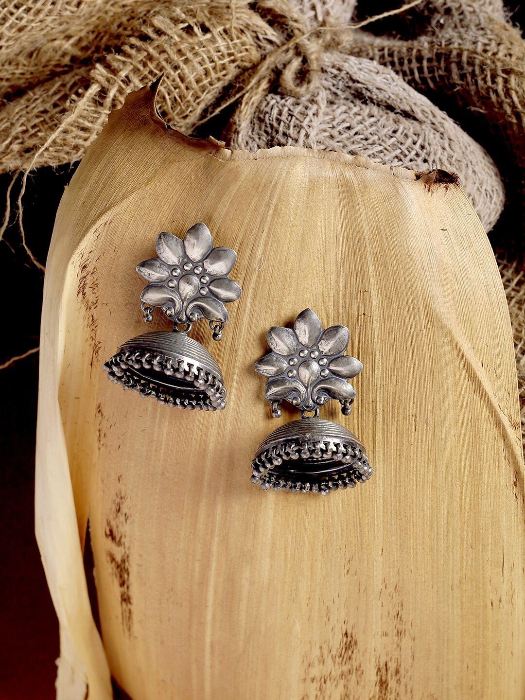 

ADORN by Nikita Ladiwala Silver-Toned Dome Shaped Drop Earrings