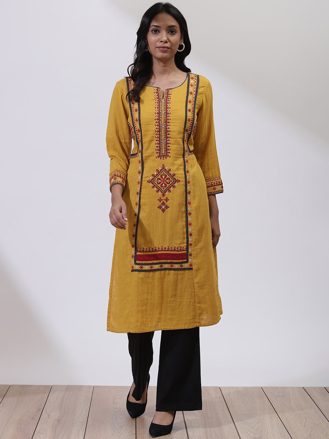 

Lakshita Women Yellow Ethnic Motifs Embroidered Keyhole Neck Thread Work Kurta