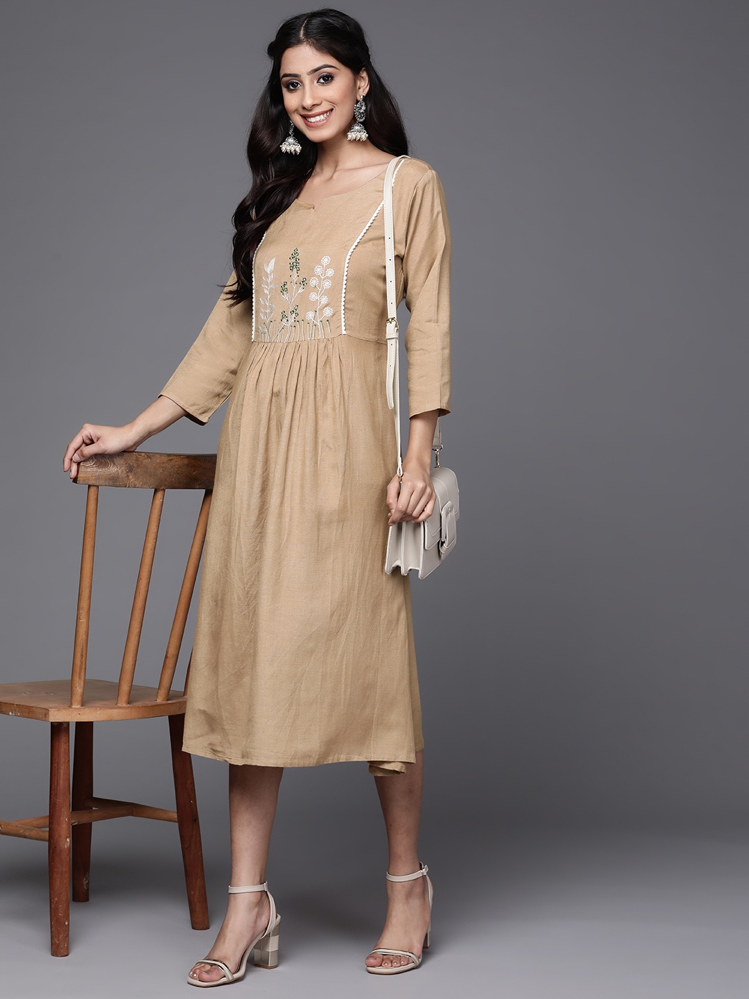 

Varanga Beige & White Yoke Embroidered Fit & Flare Midi Dress